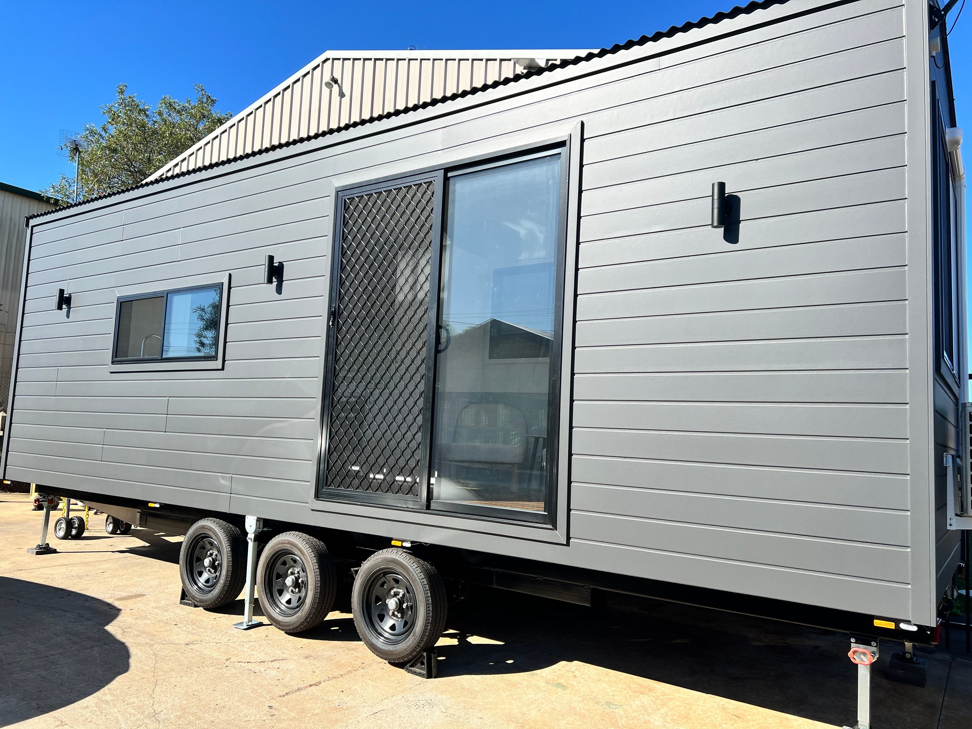 Tiny homes on wheels listed for sale, displaying different models and features with an emphasis on availability and purchasing options.