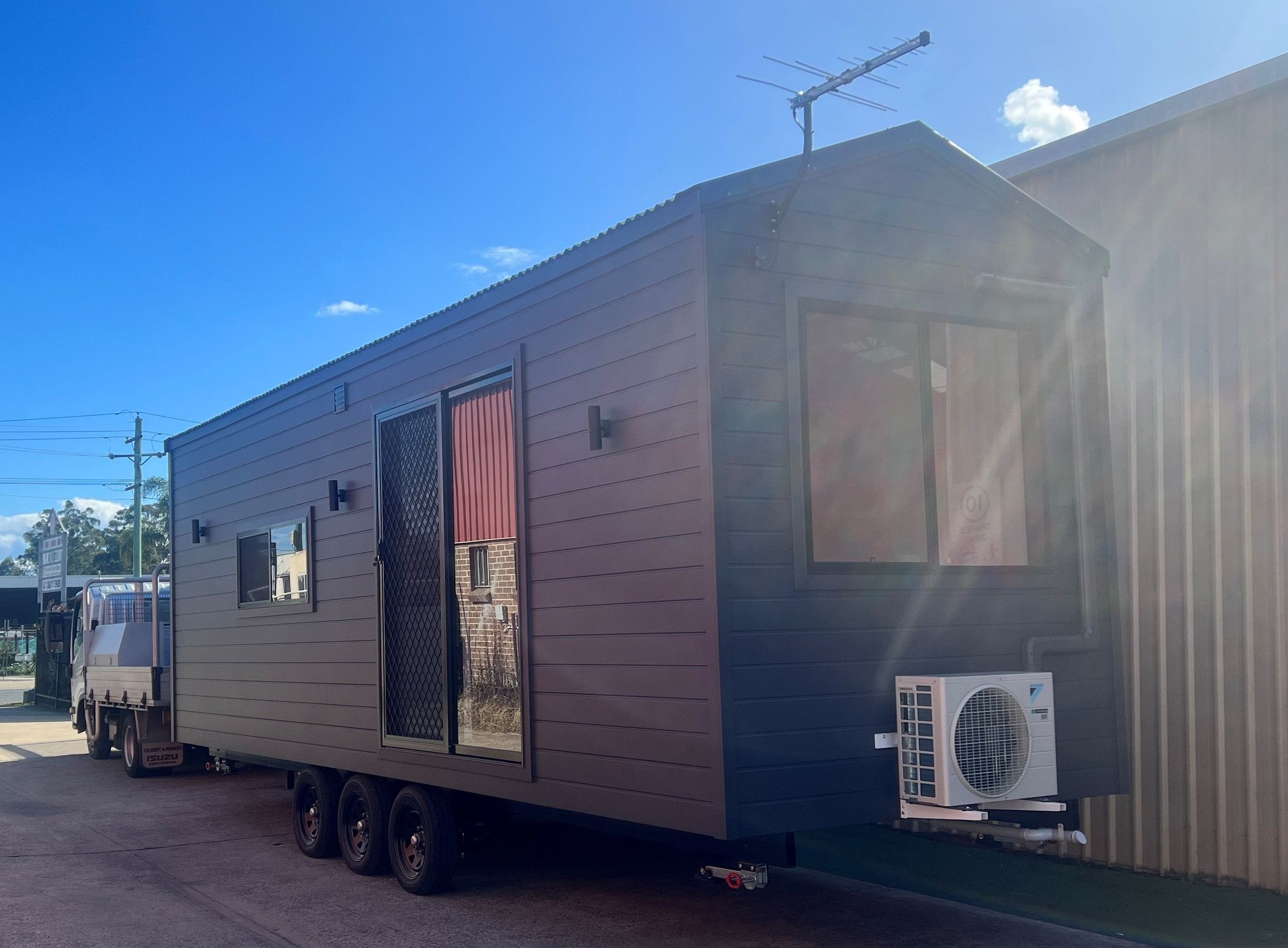 Tiny Voyager tiny house on wheels, connected and ready to tow to a new location